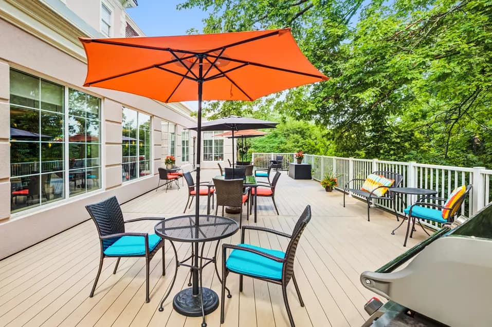 Second floor patio with furniture at Chartwell Bankside Retirement Residence