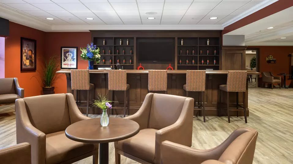 Pub and lounge seating at Chartwell Balmoral Retirement Community.