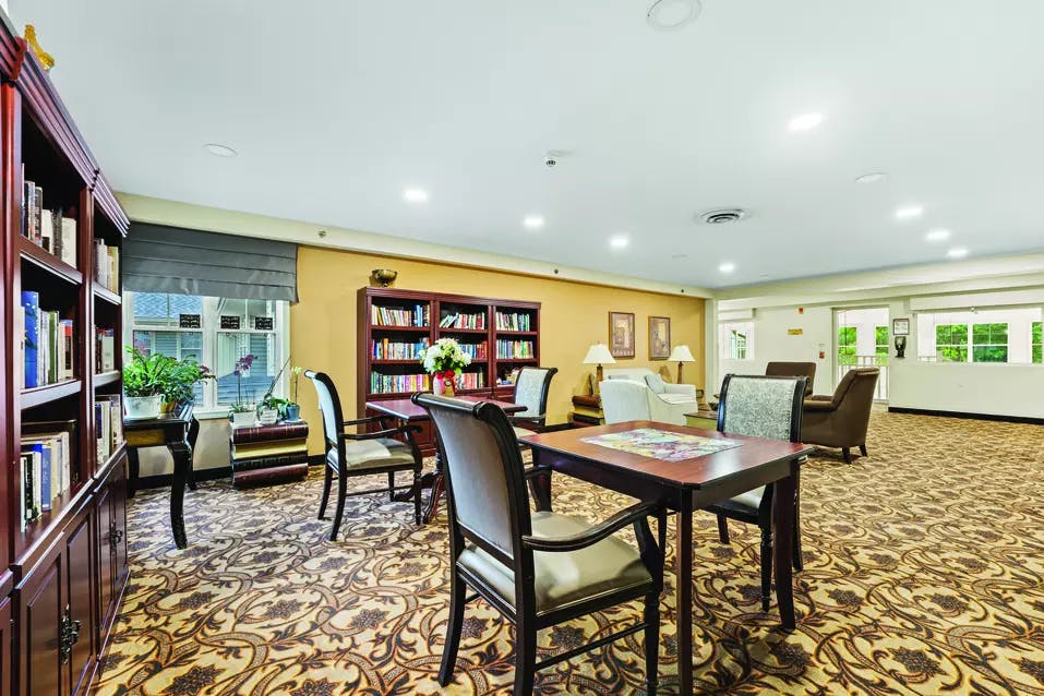 The library in one of the common areas of Chartwell Rouge Valley Retirement Residence 
