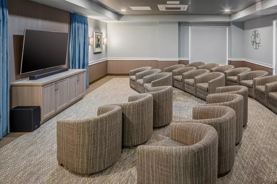 spacious movie theatre at chartwell carlton retirement residence