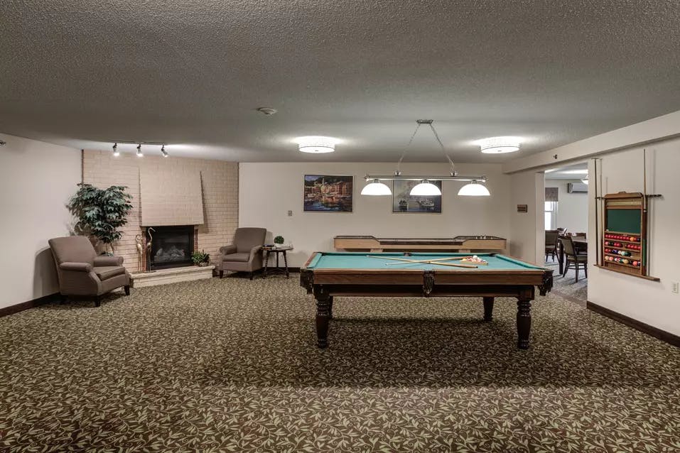 A spacious common area of Chartwell Westmount on William Retirement Residence 