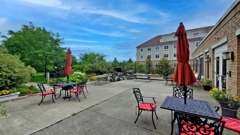 Patio with table and chairs at Chartwell Strathroy