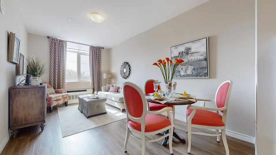 Model suite of living area at Chartwell Stoney Creeek