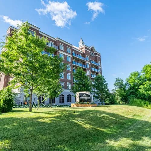 Chartwell Palermo Village Exterior. Exterior shot of the building surrounded by greenery.