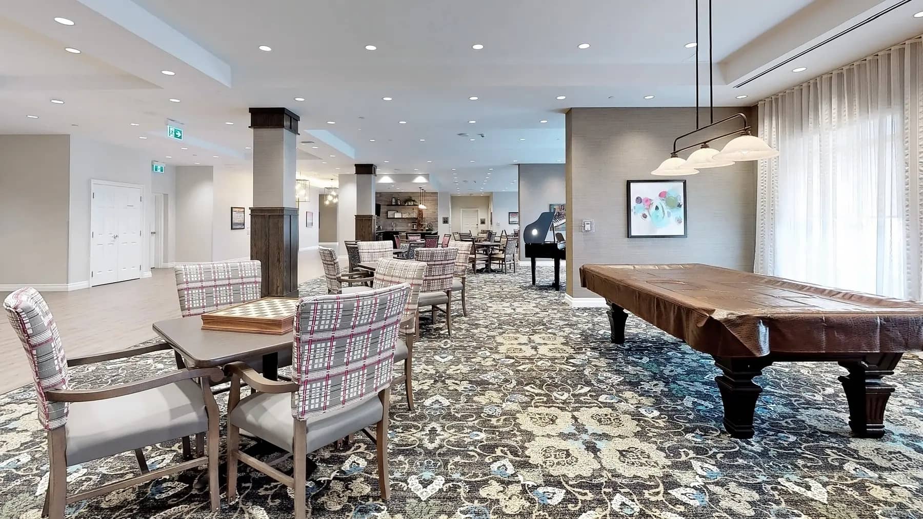 Room with table and chairs with billard table at Chartwell St. Thomas