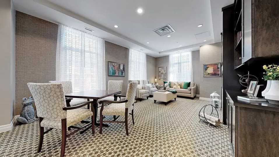 Lounge with table and chairs at Chartwell Fraser Terrace
