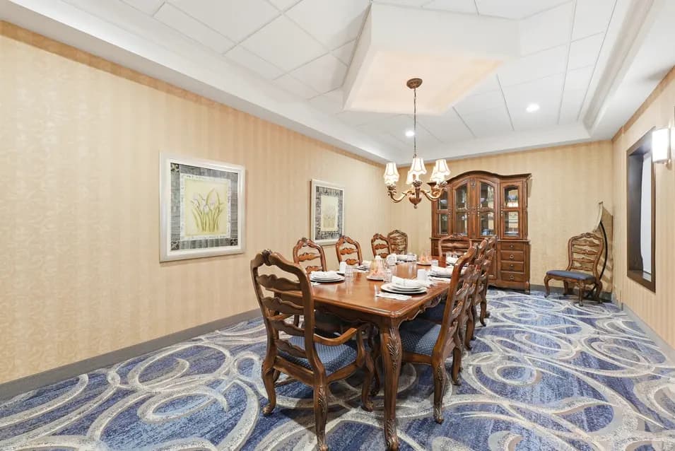 Private dining room with elegant table at Chartwell Riverside
