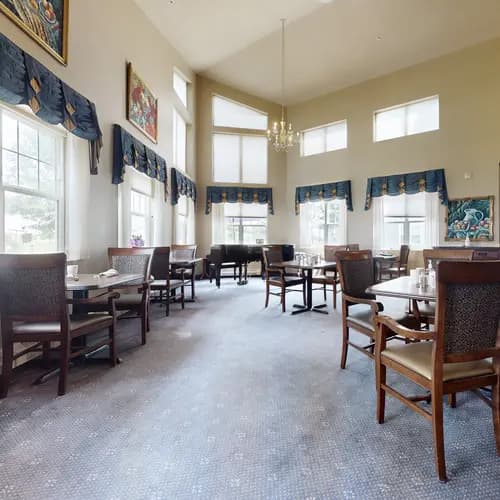 Dining room with table and chairs at Chartwell Royal Oak Village