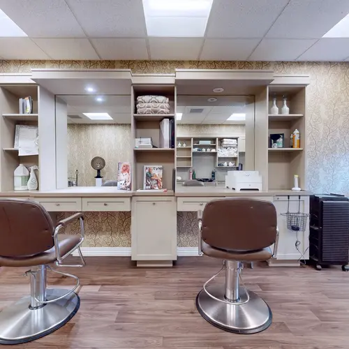 Salon with two chairs at Chartwell Milton