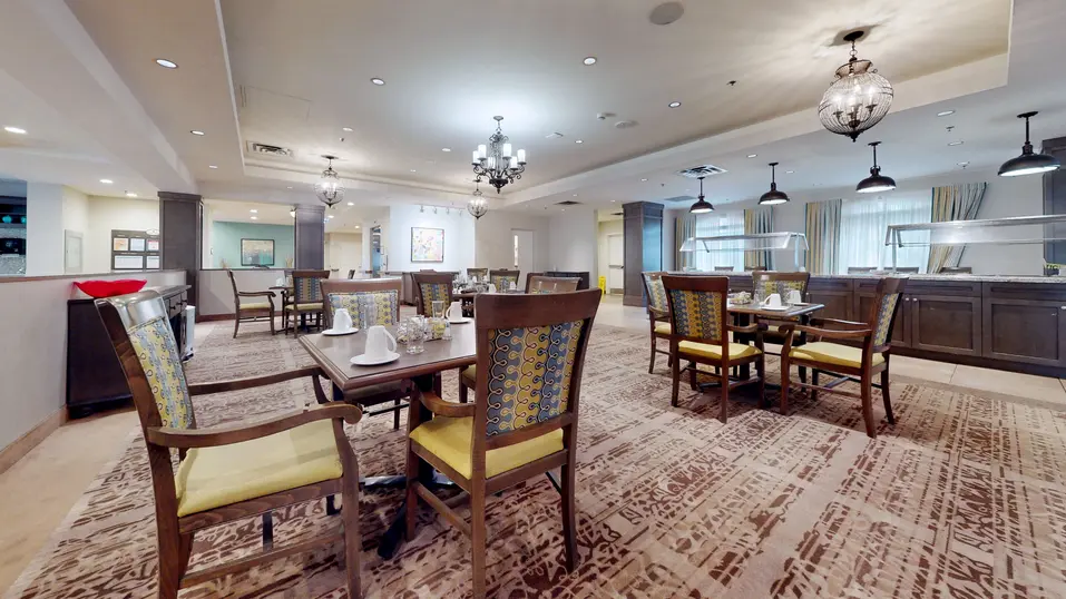 Dining room with table and chairs at Chartwell Milton