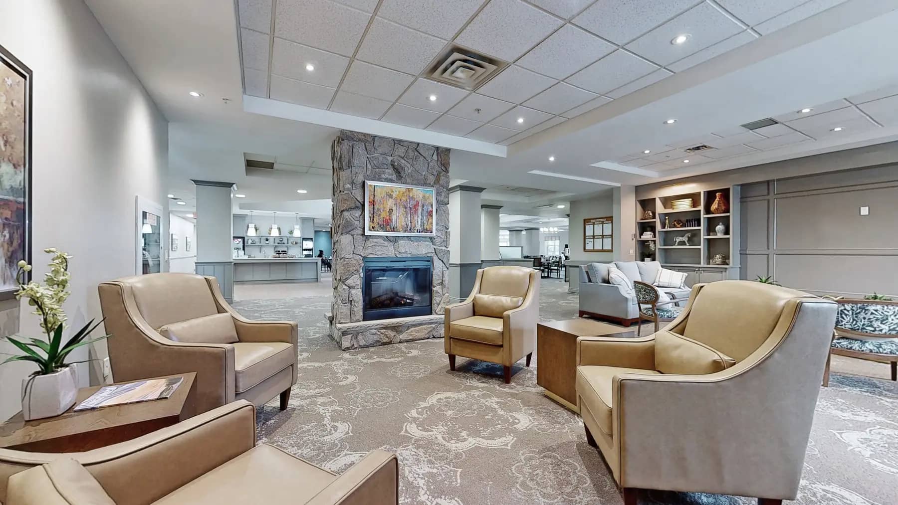 Lounge with wing back chairs at Chartwell Owen Sound