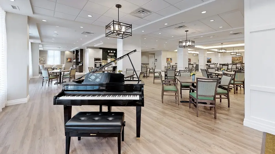 Common space area with piano at Chartwell Fraser Terrace
