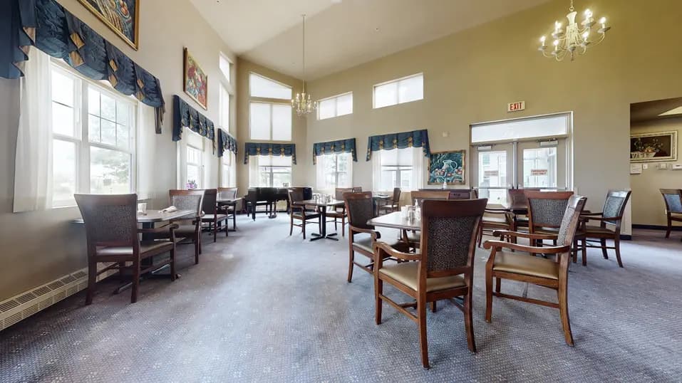 Dining room with table and chairs at Chartwell Royal Oak Village