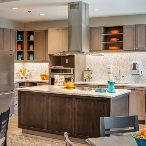 Country kitchen with table and chairs at Chartwell Stoney Creeek