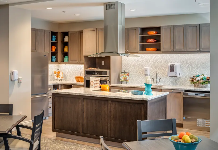 Country kitchen with table and chairs at Chartwell Stoney Creeek