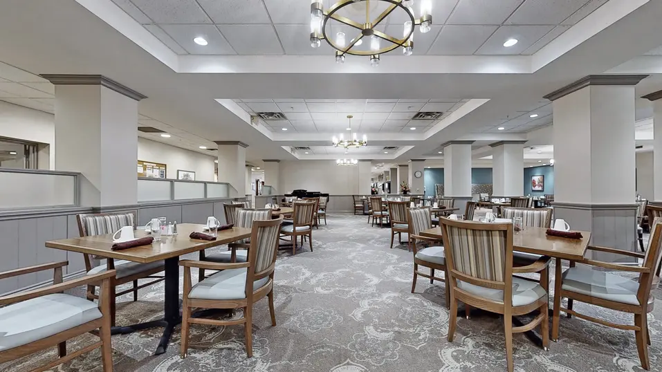 Alternative view of dining room with table and chairs at Chartwell Owen Sound