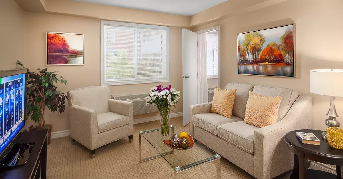 Beautiful living room in chartwell alexander muir retirement residence suite