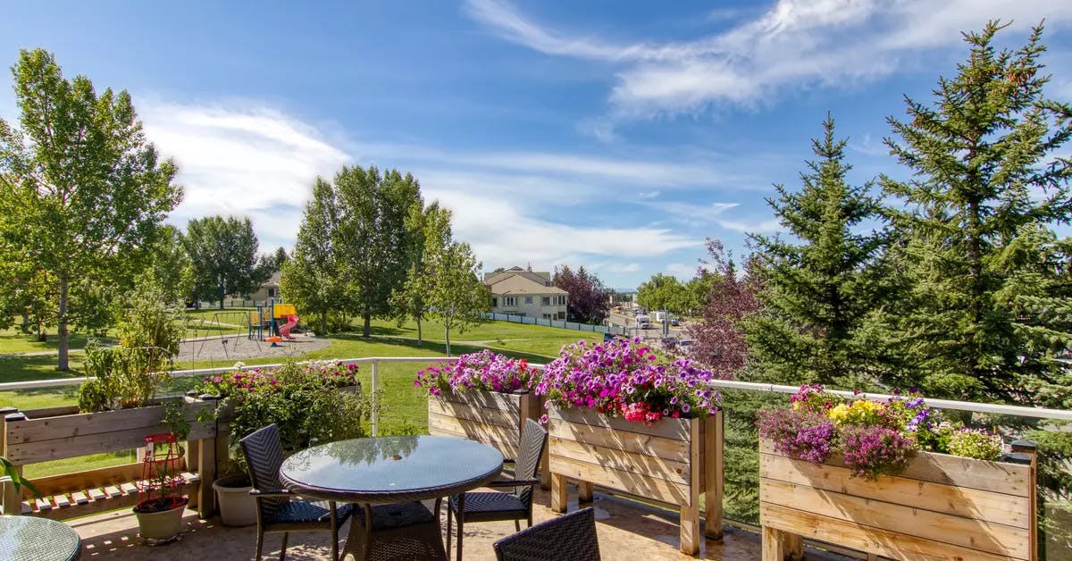 stunning patio with garden views at chartwell royal park retirement residence