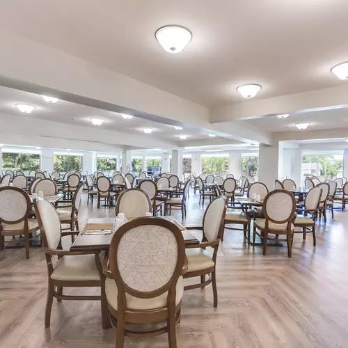 spacious dining room at chartwell st albert retirement residence