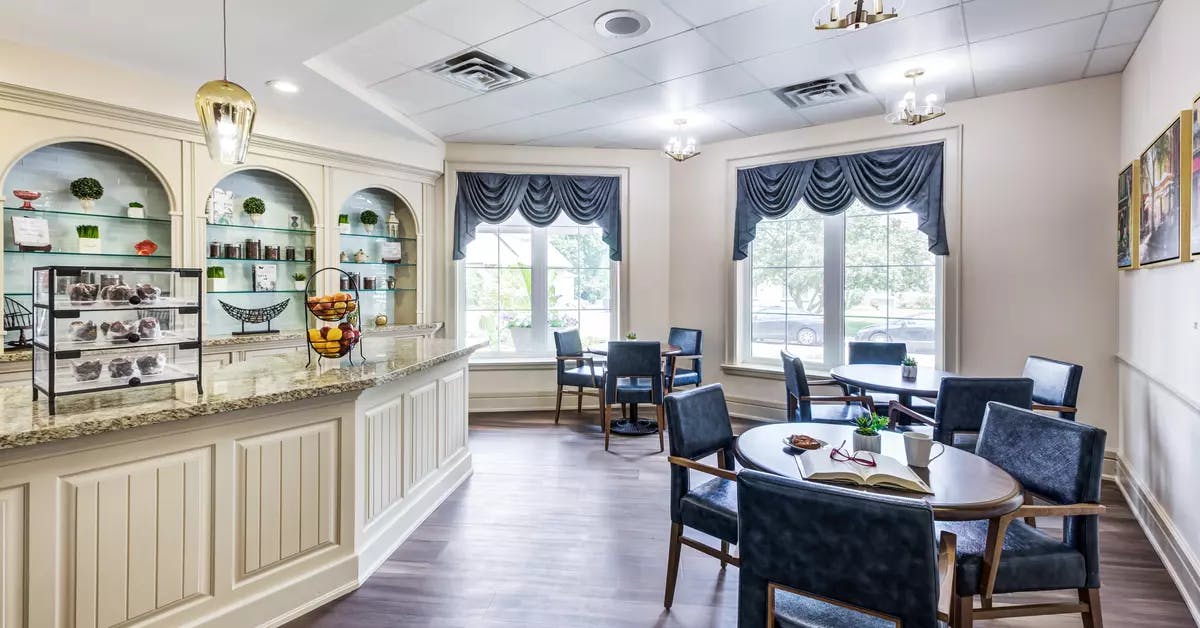 Bistro with seating at Chartwell Queen's Square Retirement Residence