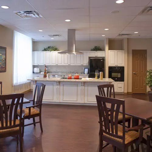 Demonstration kitchen and seating at Chartwell Valley Vista Retirement Residence 