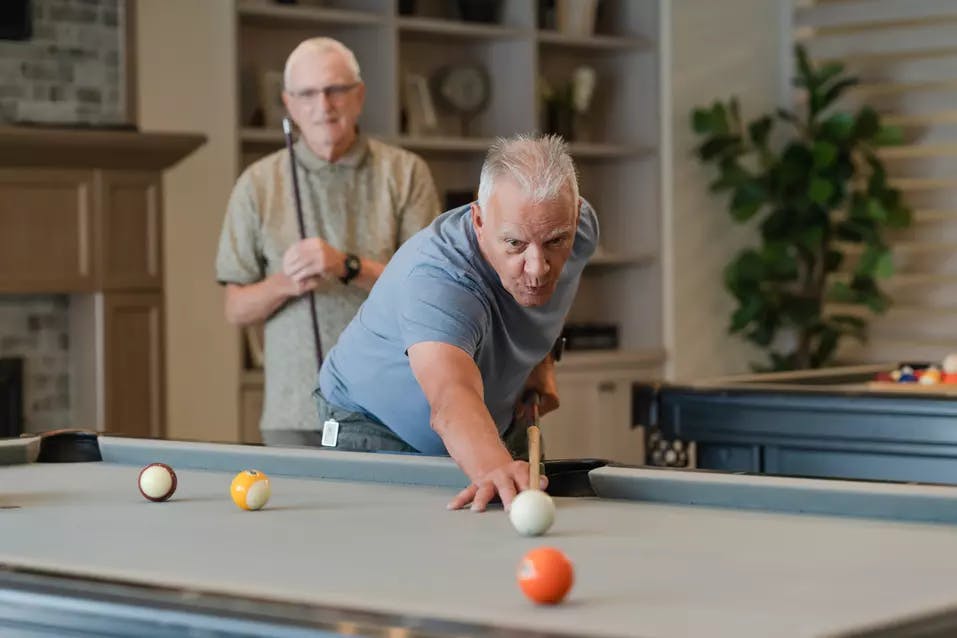 Chartwell Residents enjoying the game of Billiards