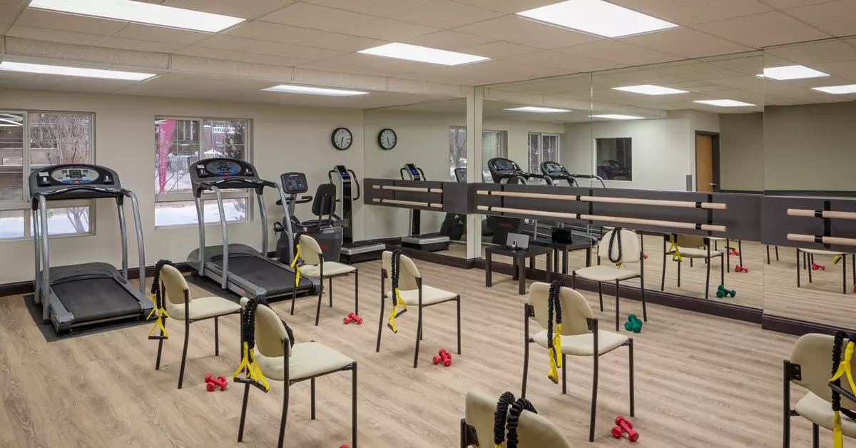modern fitness facility at chartwell fountains of mission retirement residence