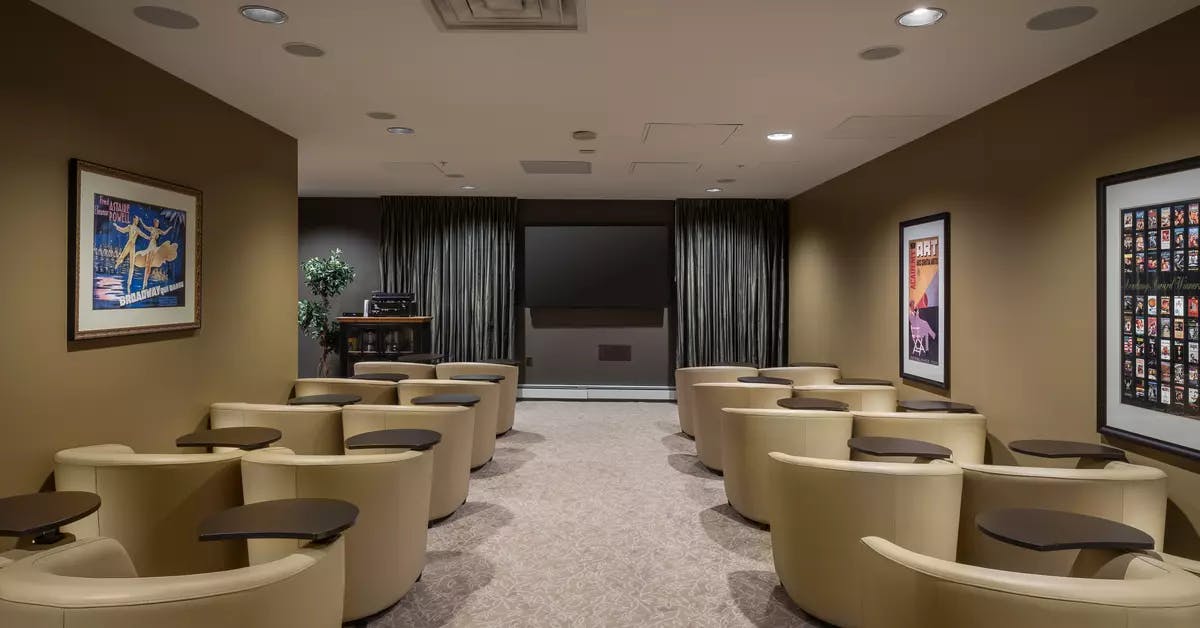 modern movie theatre at chartwell churchill house retirement residence