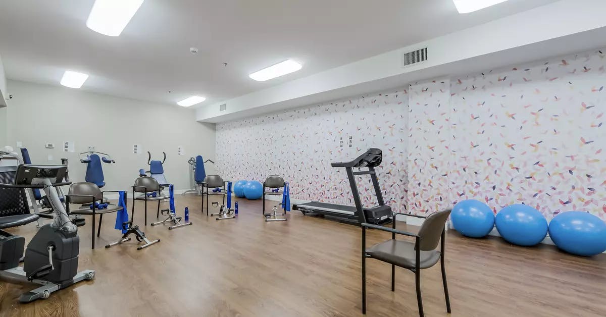 Fitness room at Chartwell Whispering Pines Retirement Residence.