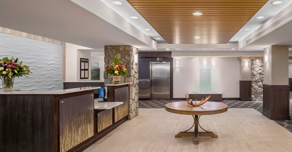 open and bright reception area at chartwell fountains of mission retirement residence