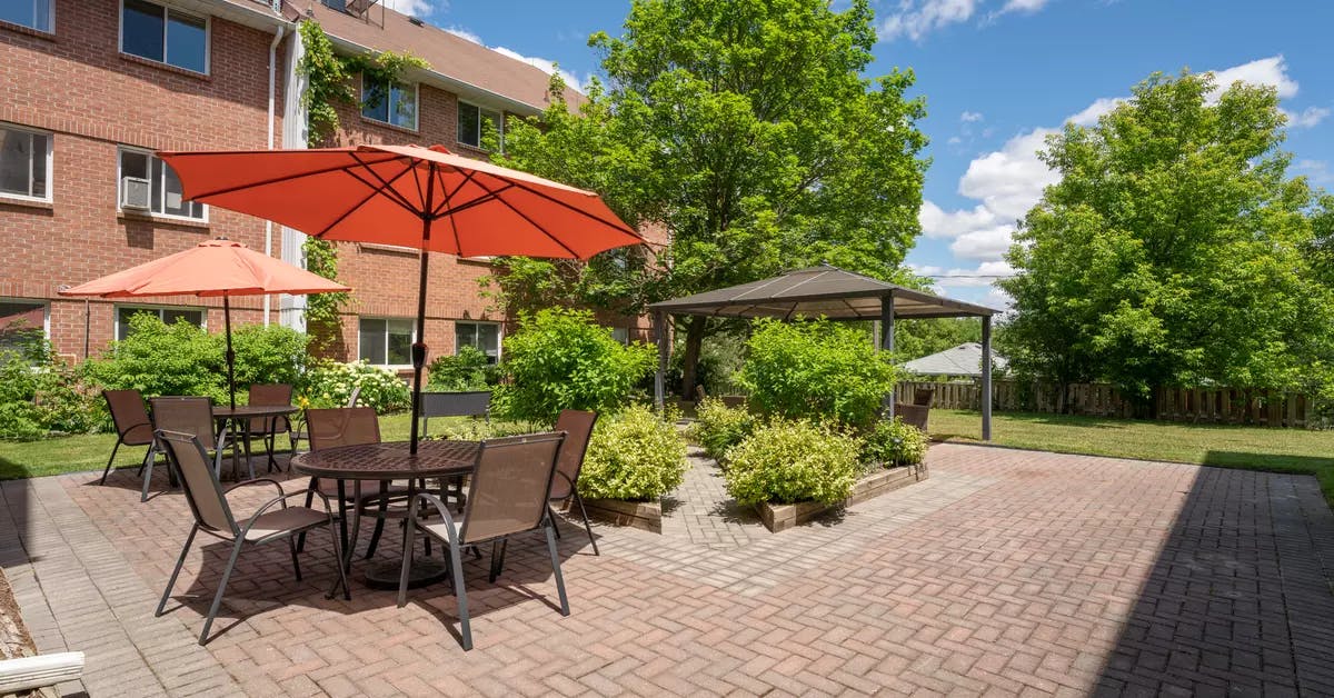 Patio with sunshine at chartwell alexander muir retirement residence