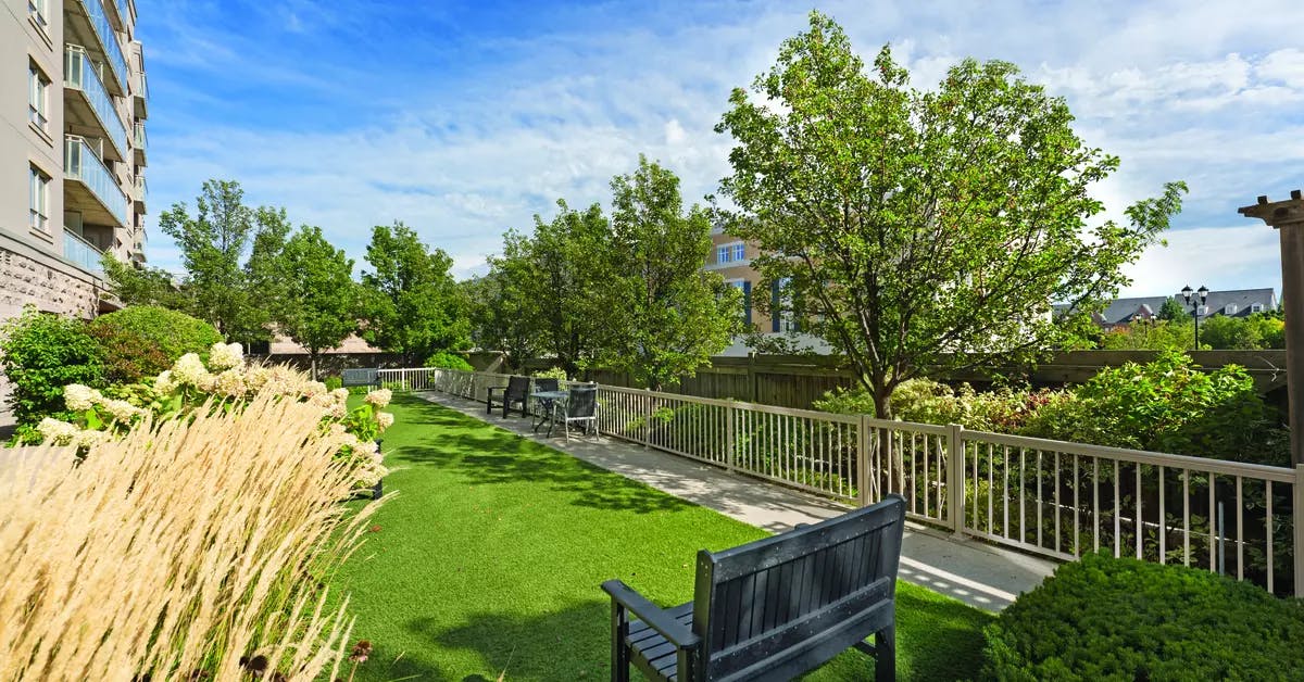Chartwell Oakville Retirement Residence outdoor greenspace with seating