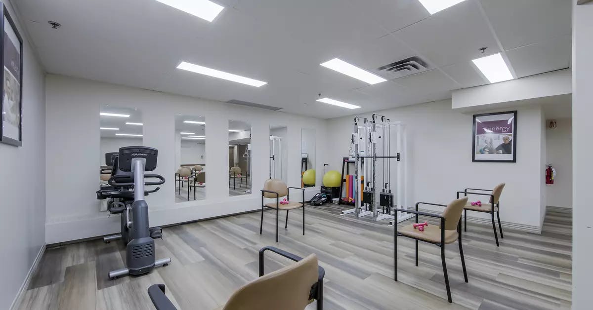 Chartwell Terrace on the Square's fitness room with exercise equipment