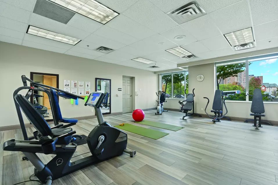 Fitness room at Chartwell Scarlett Heights Retirement Residence