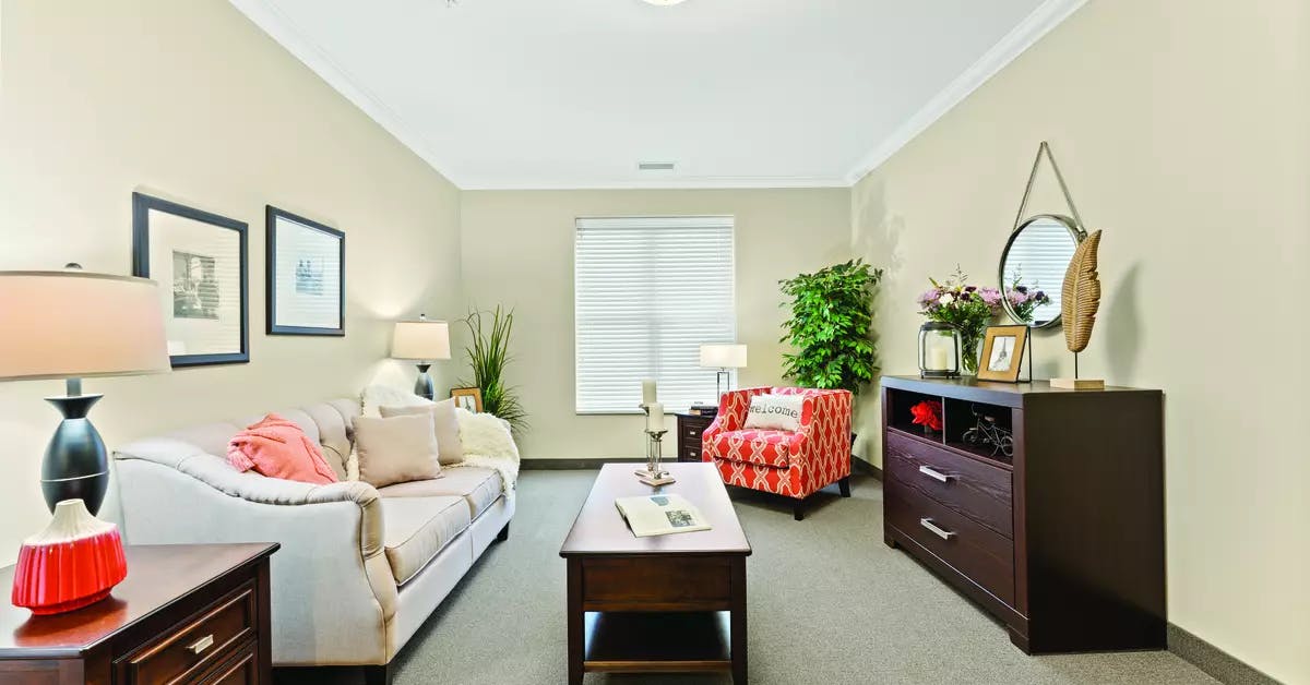 1 bedroom suite living room at chartwell bowmanville creek retirement residence