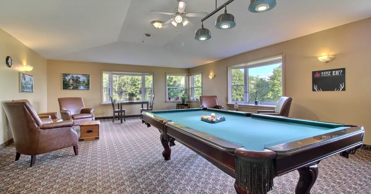billiards room at chartwell rosedale retirement residence