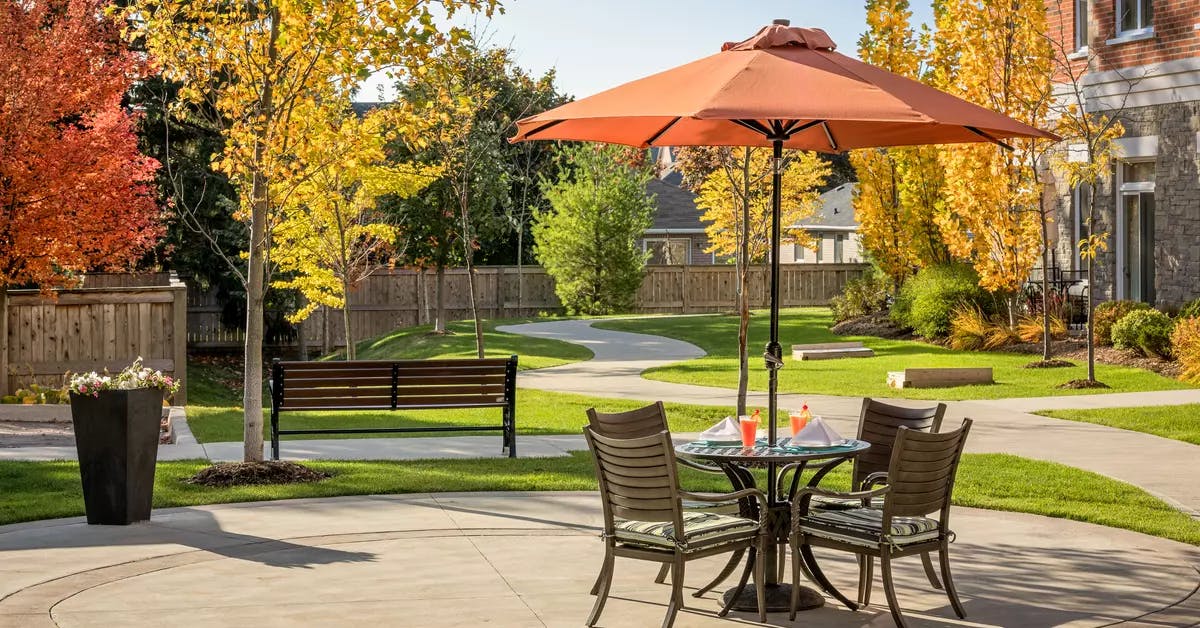 outdoor patio and walking paths at chartwell harwood retirement residence