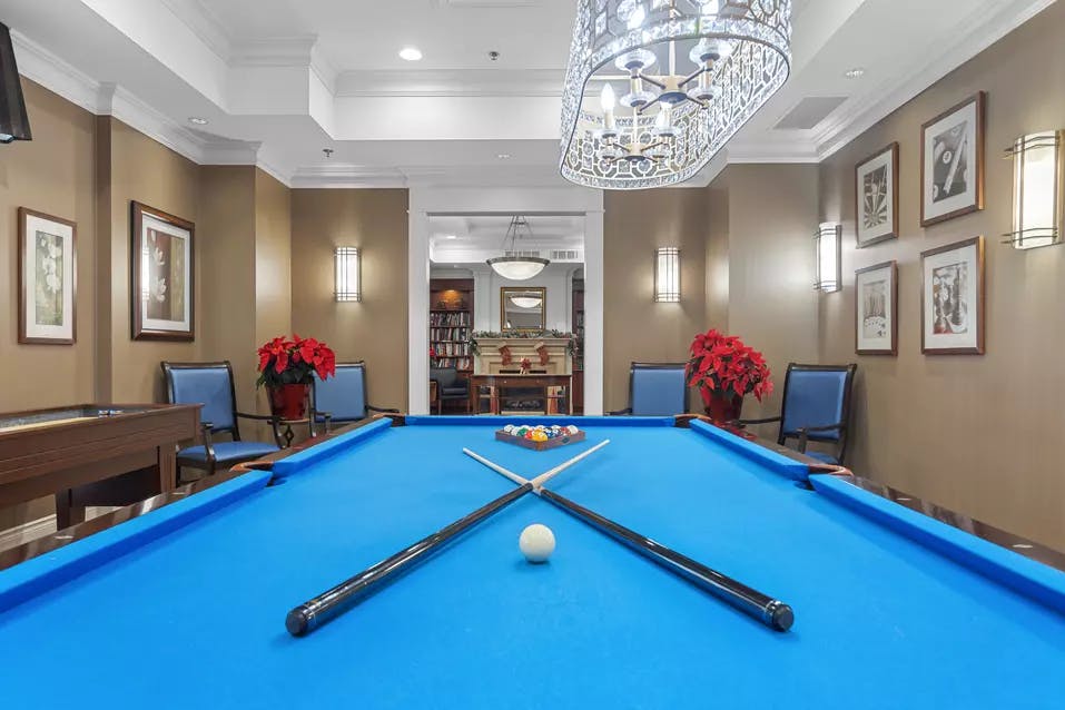 games room at chartwell rockcliffe retirement residence