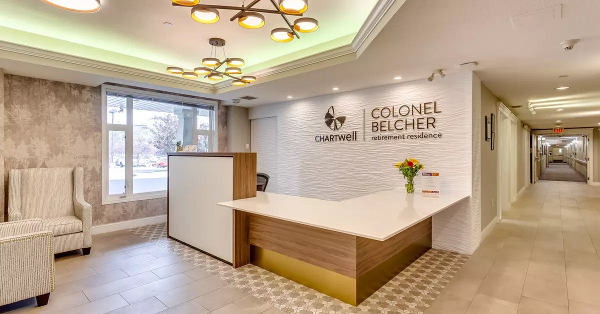 inviting and warm reception desk at chartwell colonel belcher retirement residence