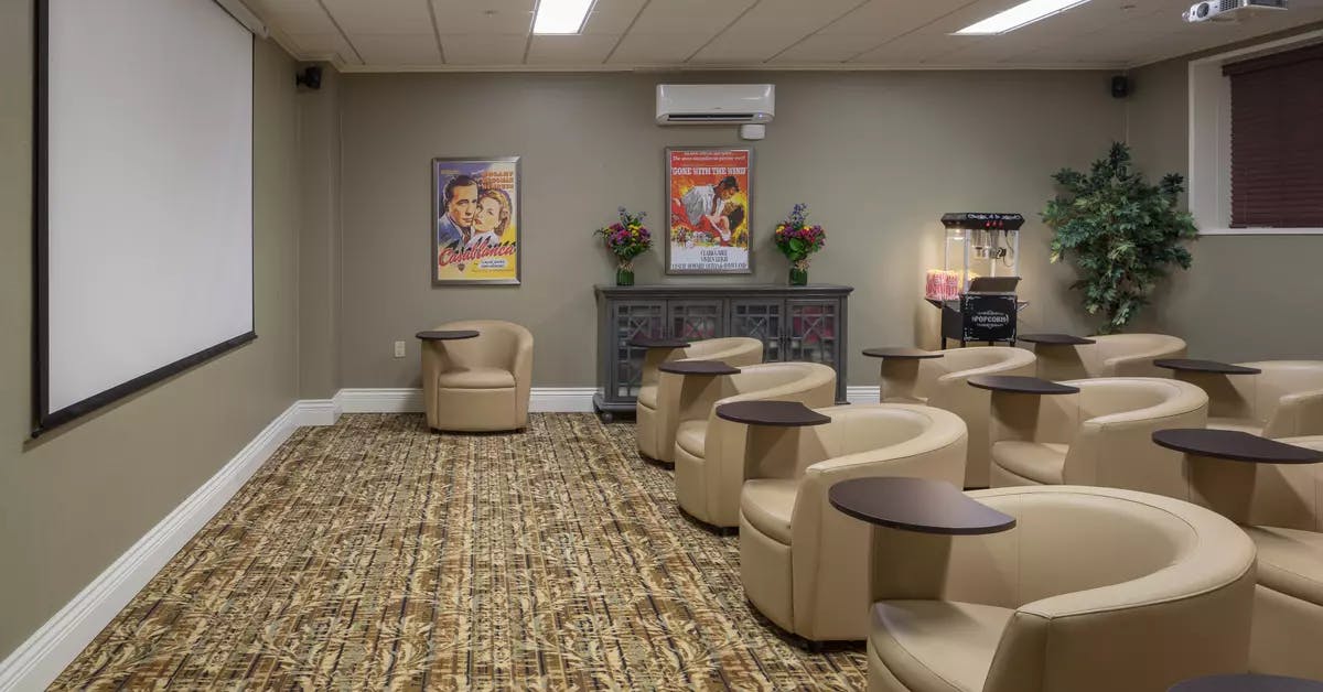 modern movie theatre at chartwell willow care residence