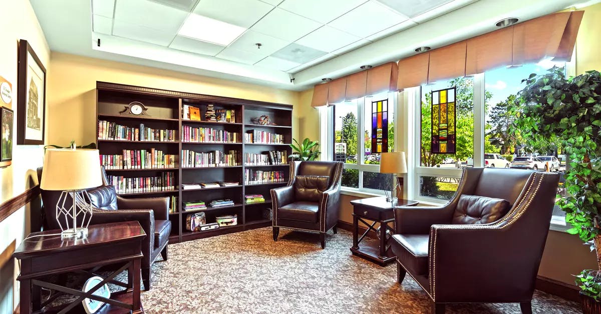 The cozy library of Chartwell Isabella Retirement Residence 