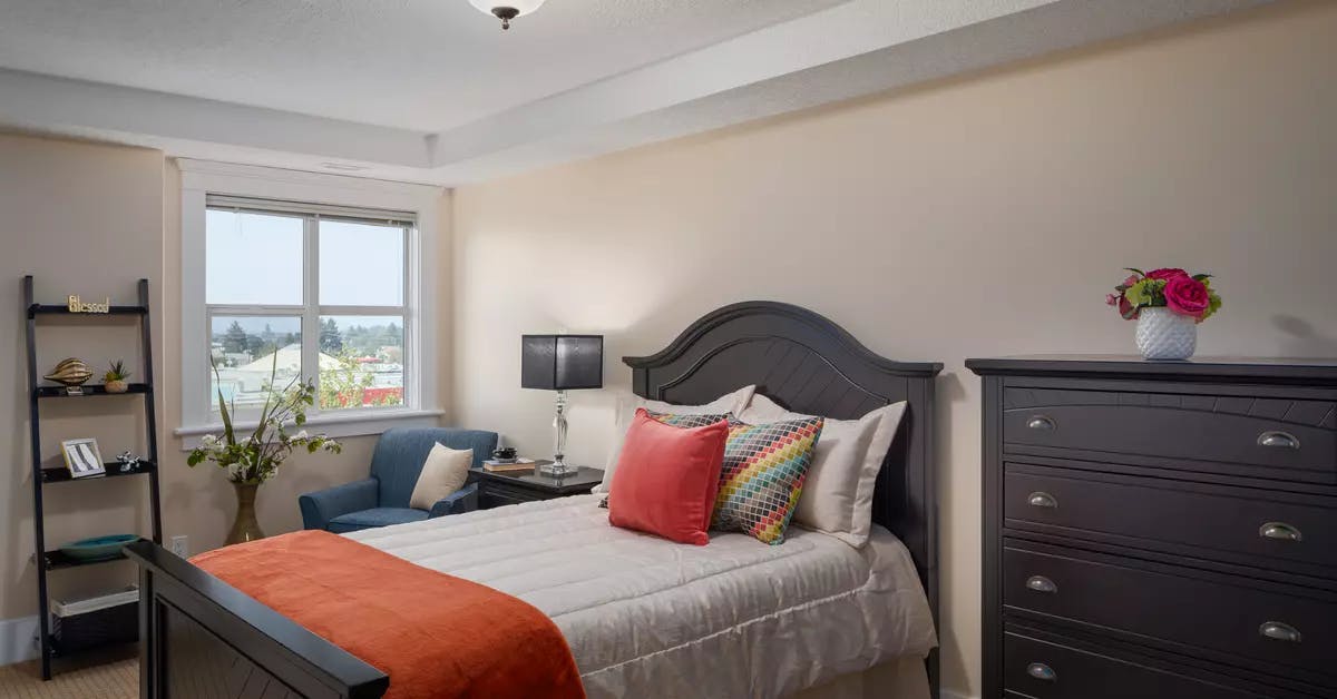 cozy and bright bedroom at chartwell kamloops retirement residence