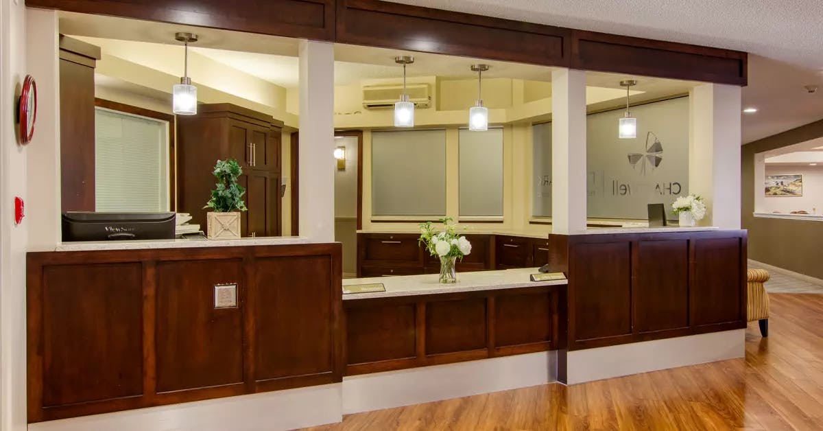 inviting reception desk at chartwell royal park retirement residence