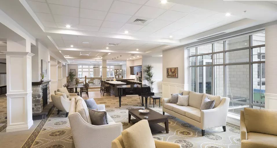 Piano lounge at Chartwell Waterford Retirement Residence