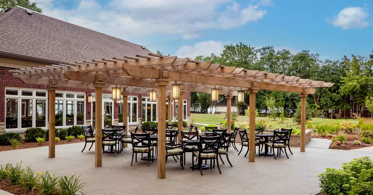 Chartwell St Clair Beach's exterior pergola, tables and chairs