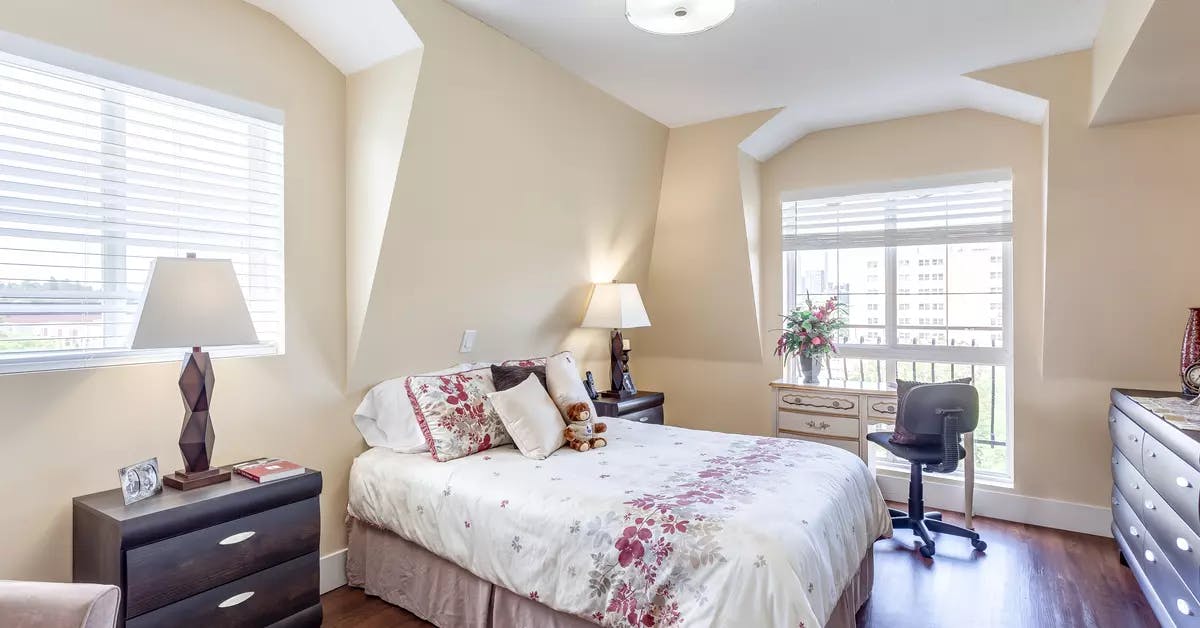 bright and sunny bedroom at chartwell fountains of mission retirement residence