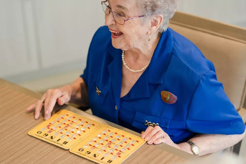 Chartwell senior resident playing Bingo