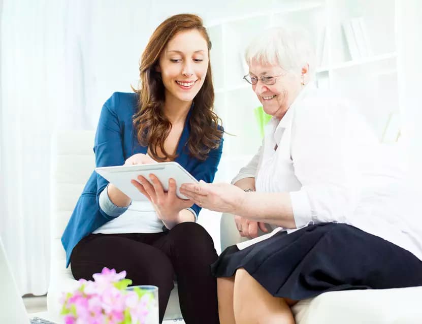 grandmother-granddaughter-using-tablet