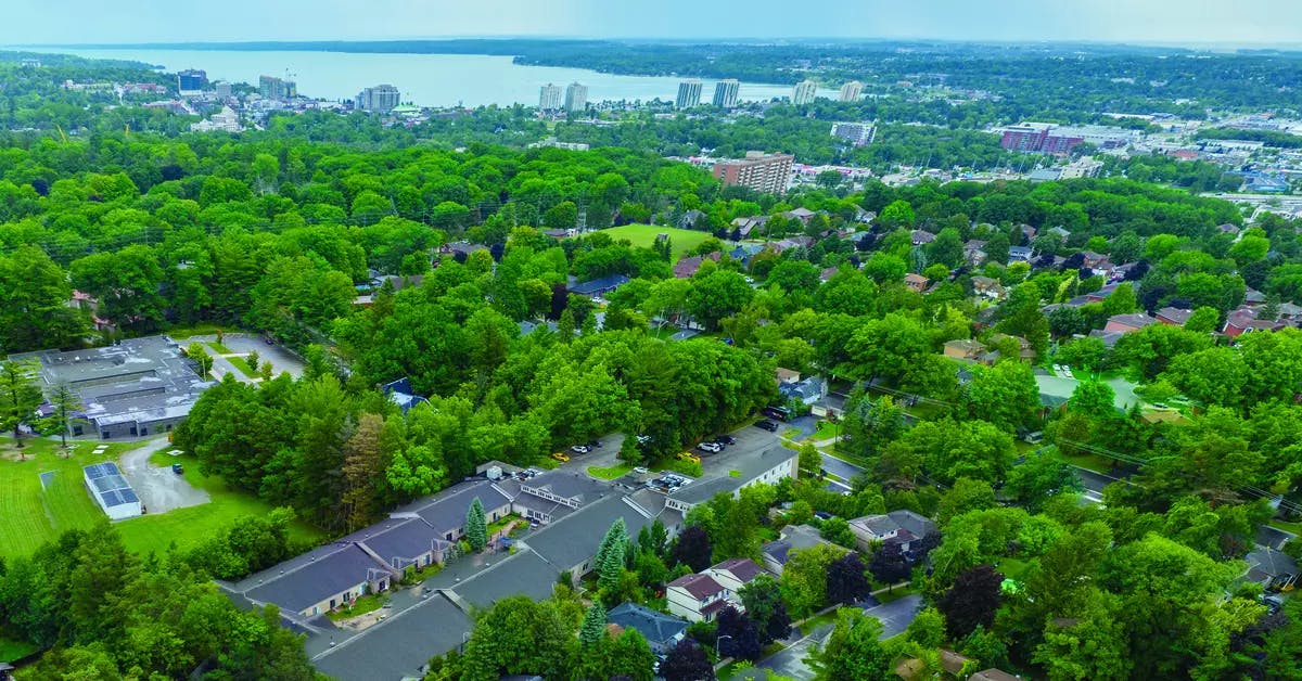 Aerial view of greenspace at Chartwell Whispering Pines Retirement Residence.