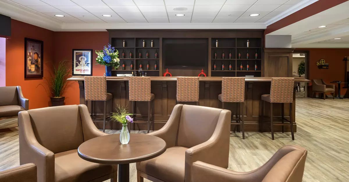 Pub and lounge seating at Chartwell Balmoral Retirement Community.